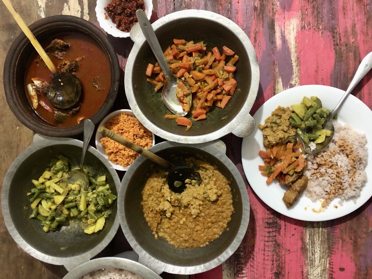 A spread of traditional Sri Lankan curries and sambols from a cooking class